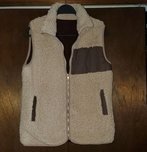 Top It Off Sherpa vest. Tan with brown trim.